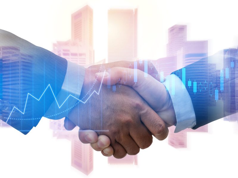 Partner. investor business man handshake with partner for successful project meeting with graph chart stock market, investment trading and city background, investor, partnership and teamwork concept